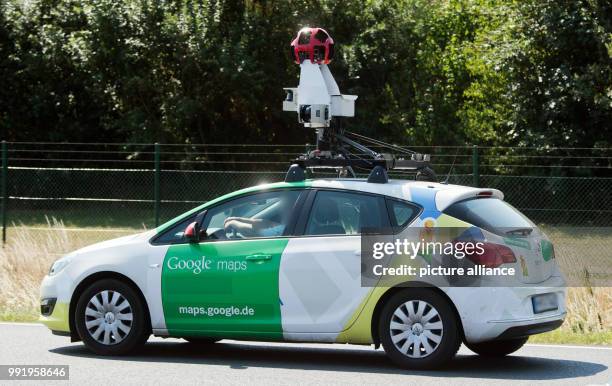 July 2018, Hanover, Germany: A vehicle of Google Maps with its 360 degree camera on its roof drives down the motorway A2. The camera vehicles of the...