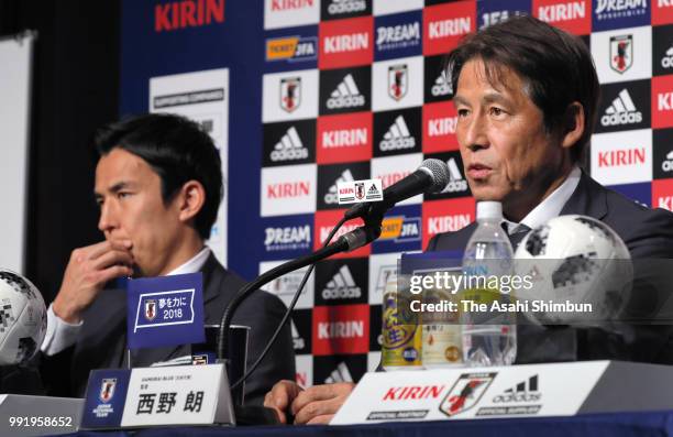 Head coach Akira Nishino and captain Makoto Hasebe of Japan attend a press conference after the FIFA World Cup on July 5, 2018 in Narita, Chiba,...