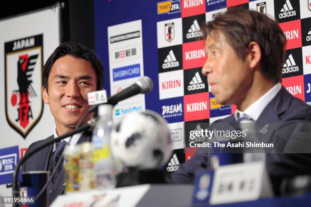 Head coach Akira Nishino and captain Makoto Hasebe of Japan attend a press conference after the FIFA World Cup on July 5, 2018 in Narita, Chiba,...