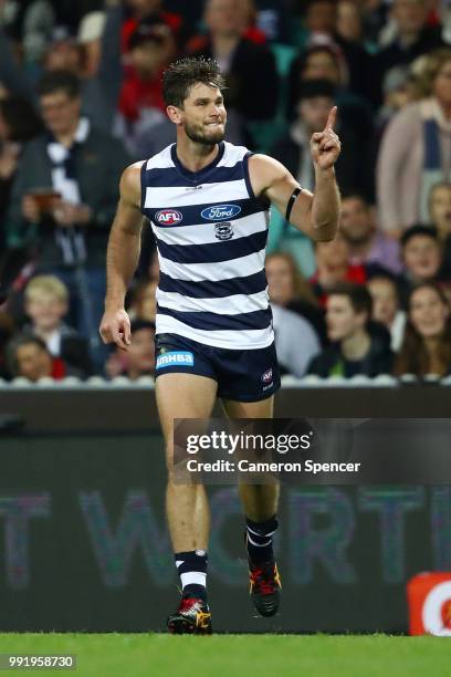 Tom Hawkins of the Cats celebrates kicking a goal during the round 16 AFL match between the Sydney Swans and the Geelong Cats at Sydney Cricket...