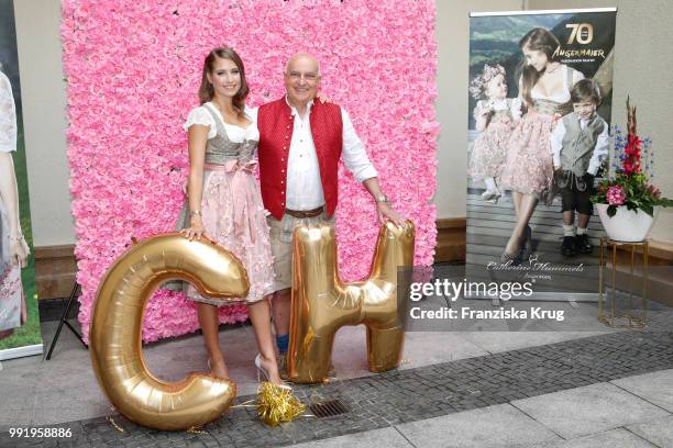 Axel Munz and Cathy Hummels during the Cathy Hummels by Angermaier collection presentation at Titanic Hotel on July 5, 2018 in Berlin, Germany.