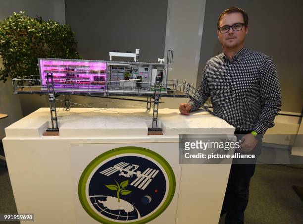 Aerospace engineer Paul Zabel stands behinds a model of the project 'Eden-ISS' at the 'Deutschen Zentrum für Luft- und Raumfahrt ' in Bremen,...