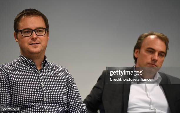 Aerospace engineer Paul Zabel and Daniel Schubert, team leader EDEN Initiative sit next to each other during a press conference at the 'Deutschen...