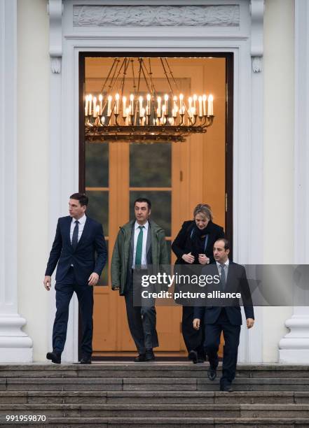 The German Green party leaders, Cem Oezdemir and Simone Peter leave the Bellevue Palace after a meeting with German President Frank-Walter Steinmeier...