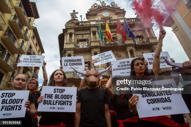 Animal rights activists protest against bullfights ahead of San Fermin Running of the bulls at Plaza Consistorial on July 5, 2018 in Pamplona, Spain....