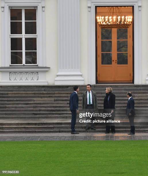 The German Green party leaders, Cem Oezdemir and Simone Peter leave the Bellevue Palace after a meeting with German President Frank-Walter Steinmeier...