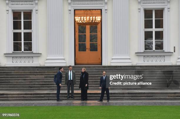 The German Green party leaders, Cem Oezdemir and Simone Peter leave the Bellevue Palace after a meeting with German President Frank-Walter Steinmeier...