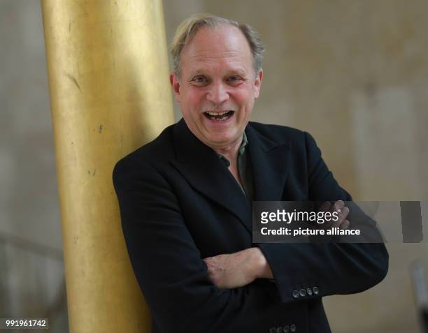 The actor, musician and writer Ulrich Tukur poses for the camera in the course of an interview in the gold hall of the Hessische Rundfunk in...