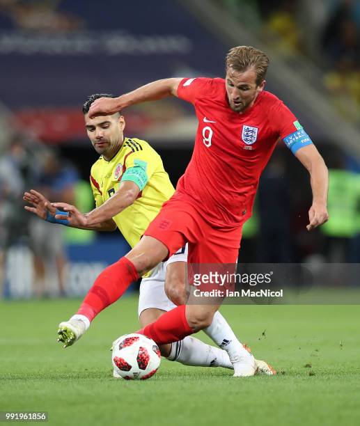 Radamel Falcao Garcia of Colombia vies with Harry Kane of England during the 2018 FIFA World Cup Russia Round of 16 match between Colombia and...