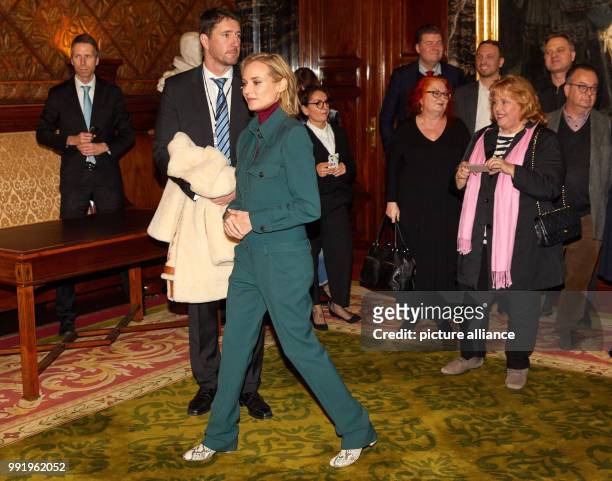 The Hollywood actress Diane Kruger arrives at the town hall of Hamburg, Germany, 21 November 2017. Kruger signed the Golden Visitors' Book of the...