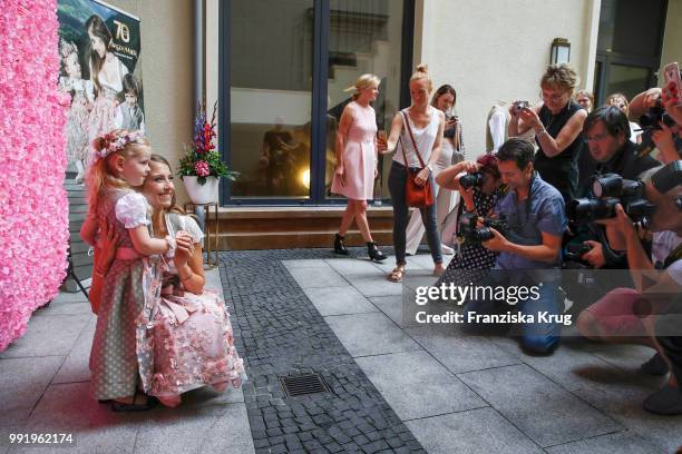 Cathy Hummels and child model Olivia pose at the Cathy Hummels by Angermaier collection presentation at Titanic Hotel on July 5, 2018 in Berlin,...