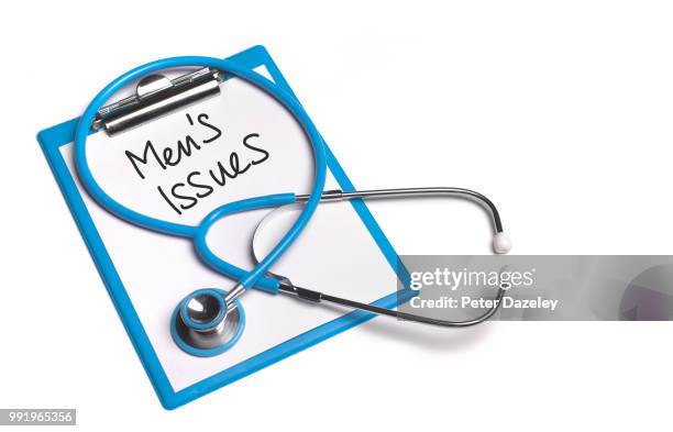 mens issues clipboard with stethoscope - peter dazeley stock pictures, royalty-free photos & images