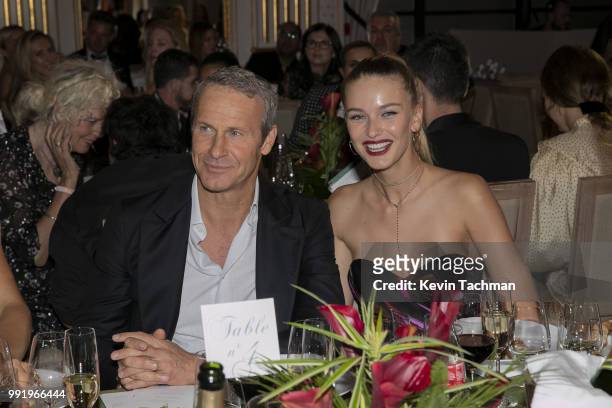 Chopard auction winner Vladislav Doronin and Kristina Romanova attend the amfAR Paris Dinner at The Peninsula Hotel on July 4, 2018 in Paris, France.