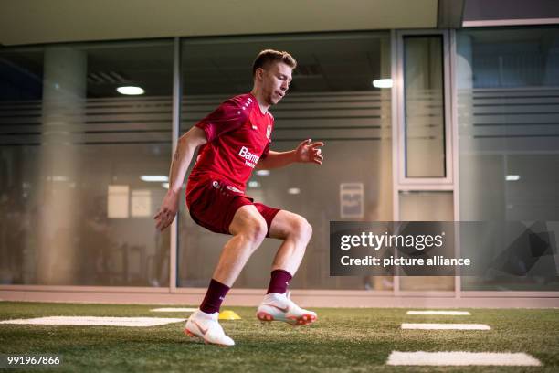 July 2018, Leverkusen, Germany - Soccer Bundesliga performance diagnosis: Mitchell Weiser performs in a speed test. Photo: Marius Becker/dpa