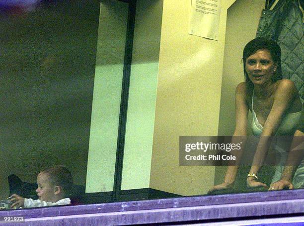 Victoria Beckham and her son Brooklyn watch the International Friendly match between England and Holland at White Hart Lane, London. DIGITAL IMAGE...