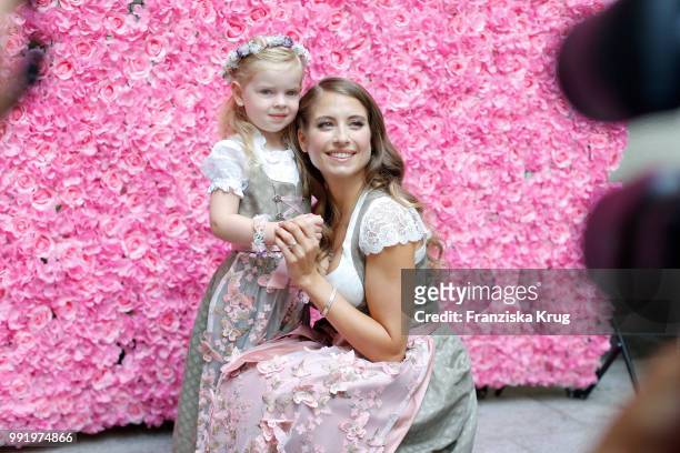 Cathy Hummels and child model Olivia pose at the Cathy Hummels by Angermaier collection presentation at Titanic Hotel on July 5, 2018 in Berlin,...