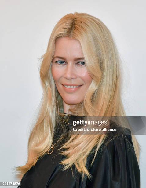 Model Claudia Schiffer arrives at a signing session on the occasion of a photo exhibition on her carreer at the CWC Gallery in Berlin, Germany, 16...