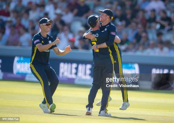 Mason Crane of Hampshire is congratulated by Dale Steyn and Joe Weatherley after running out Alex Blake of Kent during the Royal London One-Day Cup...