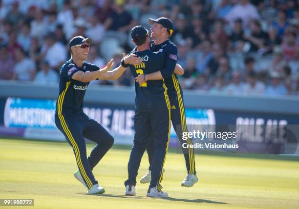 Mason Crane of Hampshire is congratulated by Dale Steyn and Joe Weatherley after running out Alex Blake of Kent during the Royal London One-Day Cup...