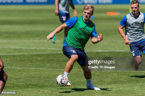 Johannes Geis of Schalke controls the ball during a training session at the FC Schalke 04 Training center on July 2, 2018 in Gelsenkirchen, Germany.