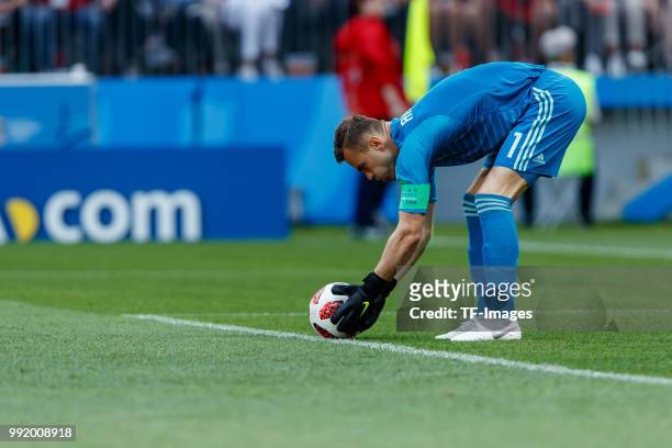 Goalkeeper Igor Akinfeev of Russia controls the ball during the 2018 FIFA World Cup Russia match between Spain and Russia at Luzhniki Stadium on July...