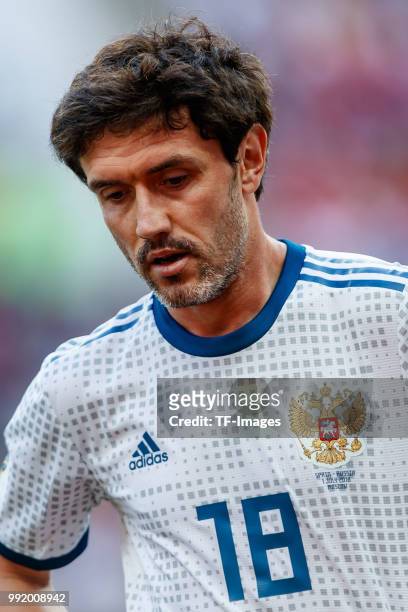 Yury Zhirkov of Russia looks on during the 2018 FIFA World Cup Russia match between Spain and Russia at Luzhniki Stadium on July 01, 2018 in Moscow,...