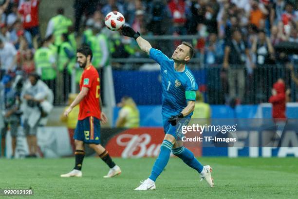 Goalkeeper Igor Akinfeev of Russia controls the ball during the 2018 FIFA World Cup Russia match between Spain and Russia at Luzhniki Stadium on July...