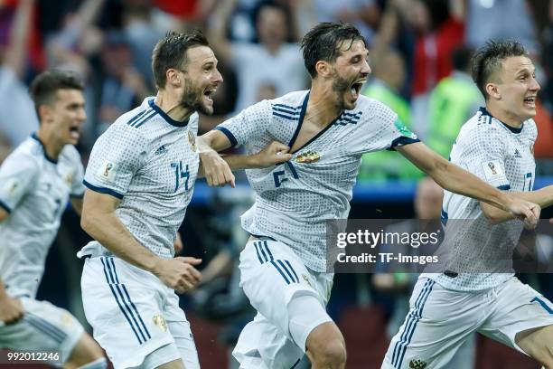 Vladimir Granat of Russia and Aleksadr Erokhin of Russia celebrate after winning the 2018 FIFA World Cup Russia match between Spain and Russia at...