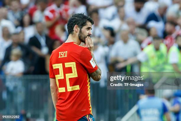 Isco of Spain looks dejected after the 2018 FIFA World Cup Russia match between Spain and Russia at Luzhniki Stadium on July 01, 2018 in Moscow,...