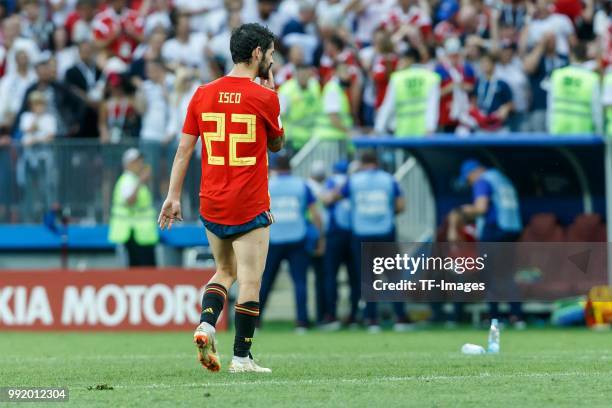 Isco of Spain looks dejected after the 2018 FIFA World Cup Russia match between Spain and Russia at Luzhniki Stadium on July 01, 2018 in Moscow,...