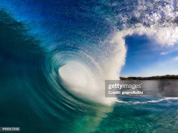 big blue - tube wave stock pictures, royalty-free photos & images