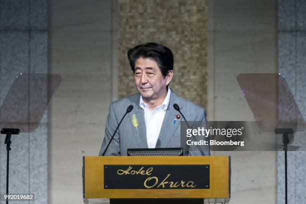 Shinzo Abe, Japan's prime minister, pauses while speaking at The Shared Values and Democracy in Asia symposium in Tokyo, Japan, on Thursday, July 5,...