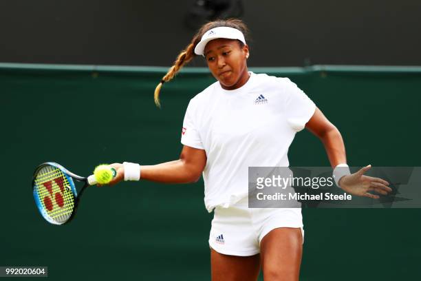 Naomi Osaka of Japan plays a forehand during her Ladies' Singles second round match against Katie Boulter of Great Britain on day four of the...