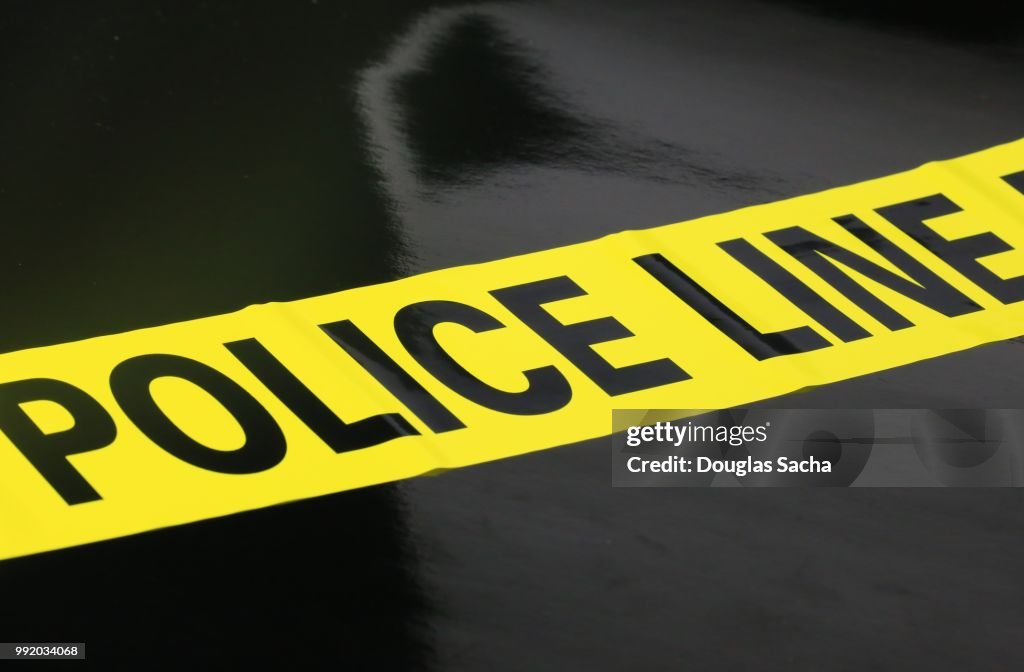 Police Caution Tape on a black background