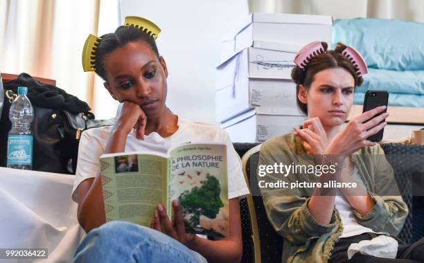 July 2018, Berlin, Germany: Models backstage at the show of the label "Marcel Ostertag" in the gardens of the Westin Grand Hotel. Collections for...