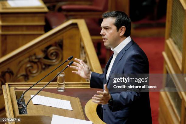 July 2018, Athens, Greece: Alexis Tsipras, prime minister of Greece speaks durng a debate in the greek parliament. After eight years of austerity...