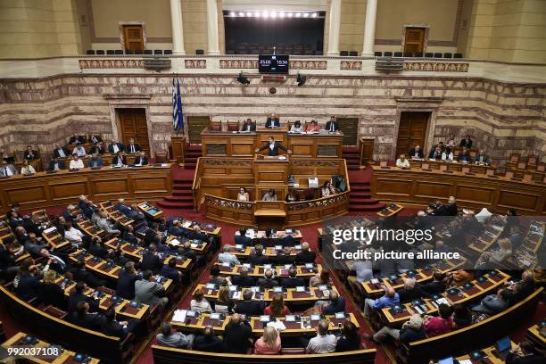 July 2018, Athens, Greece: Alexis Tsipras , prime minister of Greece speaks durng a debate in the greek parliament. After eight years of austerity...