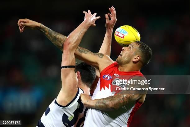 Lance Franklin of the Swans spoils the ball during the round 16 AFL match between the Sydney Swans and the Geelong Cats at Sydney Cricket Ground on...