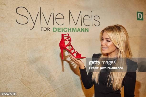 Host and model Sylvie Meis presents her new shoe collection for Deichmann in Hamburg, Germany, 22 November 2017. Photo: Georg Wendt/dpa
