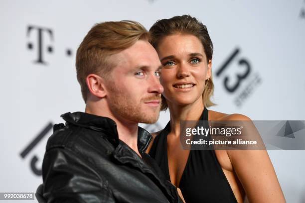 July 2018, Munich, Germany: The contestant of "bet that", Samuel Koch and his wife Sarah Elena Timpe arrive to the Shocking Short Awards at the...