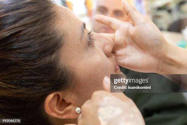 latin woman at kimono beauty salon - kumikomini stock pictures, royalty-free photos & images