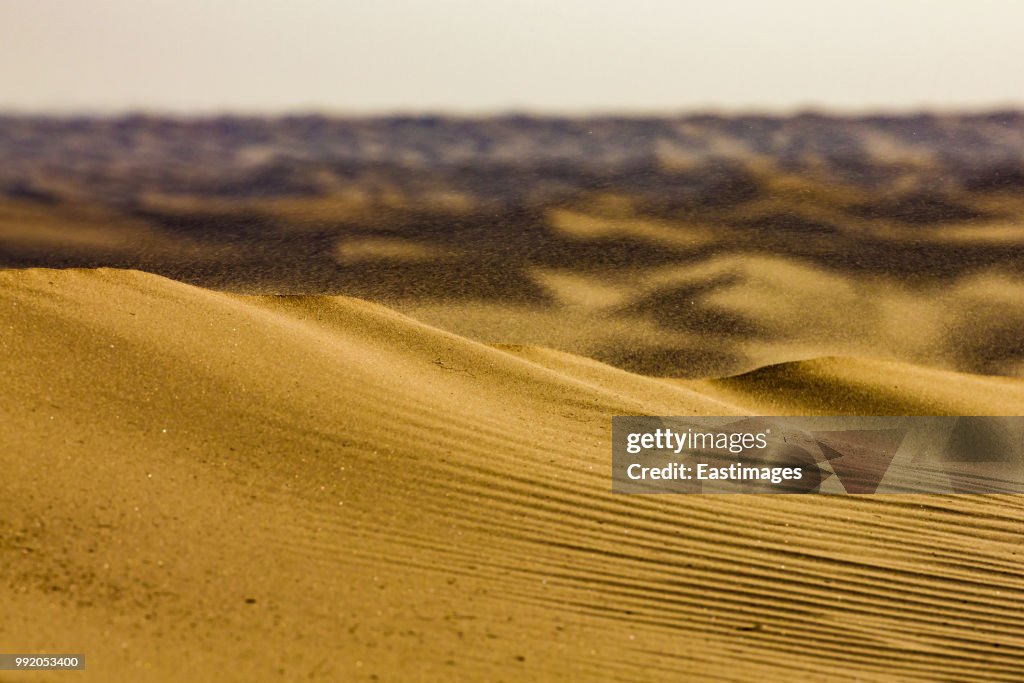 Sunset over sand dunes