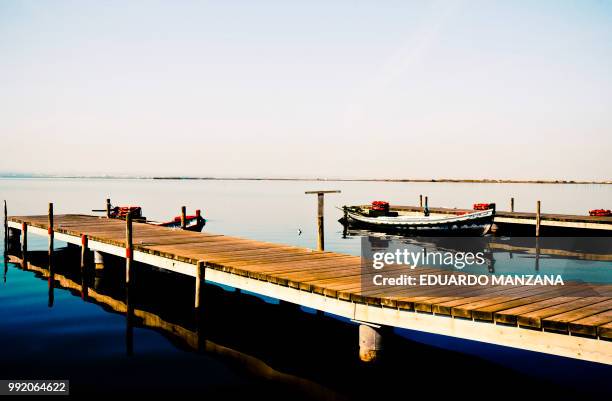 boats in the water - manzana stock pictures, royalty-free photos & images