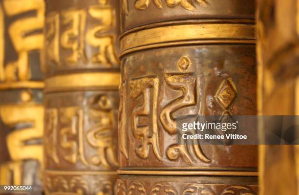 prayer wheels at dro-dul chorten in gangtok, india - gangtok ストックフォトと画像