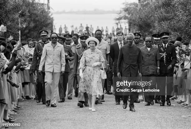 Queen Elizabeth II is met by President Julius Nyerere at Dar es Salaam airport, at the start of a three-day State Visit, 18th July 1979. Prince...