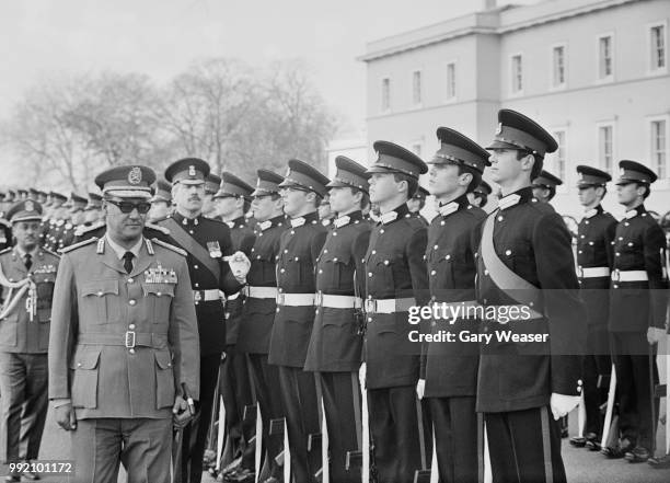 Major-General Gaafar Muhammad an-Nimeiry , the President of the Sudan inspects a guard of honour at the Royal Military Academy at Sandhurst, 26th...