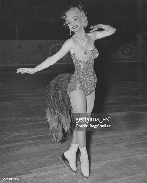 American ice skater Gloria Nord practises at the Empire Pool in Wembley, London, for her appearance in the Royal Command Variety Performance, 20th...