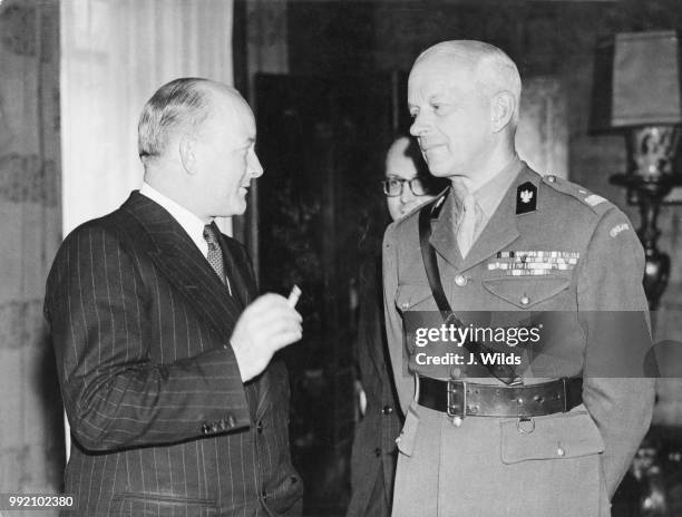 Polish Prime Minister Stanislaw Mikolajczyk with General Bronislaw Regulski , the Polish attaché in Great Britain, at the Polish Embassy in London,...