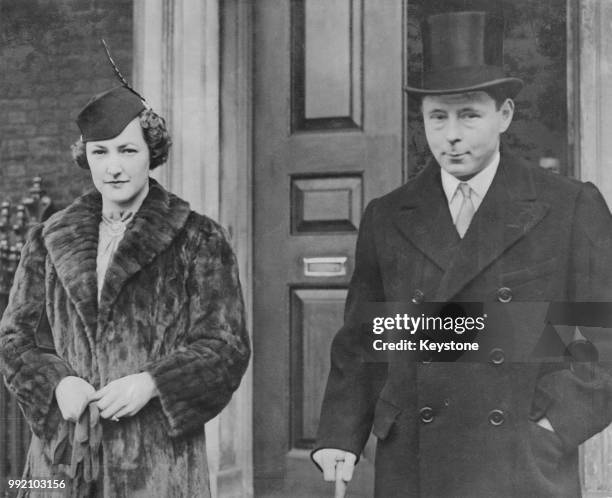 Bernard Fitzalan-Howard, 16th Duke of Norfolk and his wife Lavinia Fitzalan-Howard, Duchess of Norfolk leave London for Arundel, the Duke's family...