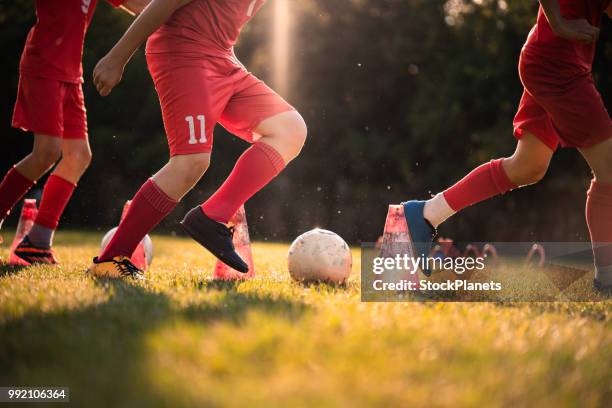 football training - children sports league stock pictures, royalty-free photos & images